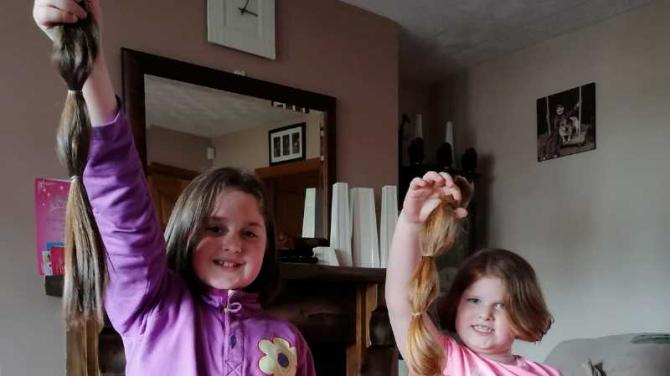 Kind-hearted Ballymagorry sisters lose their long locks to help others