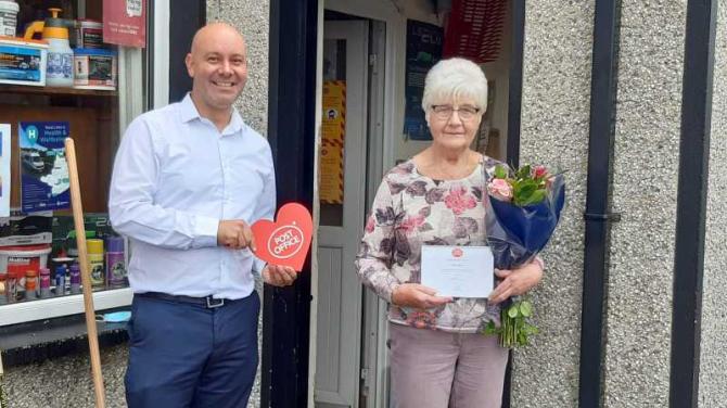 Killen postmaster reaches 40 year service milestone